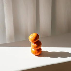A tangerines picture from the Duolingo English Test image description task.