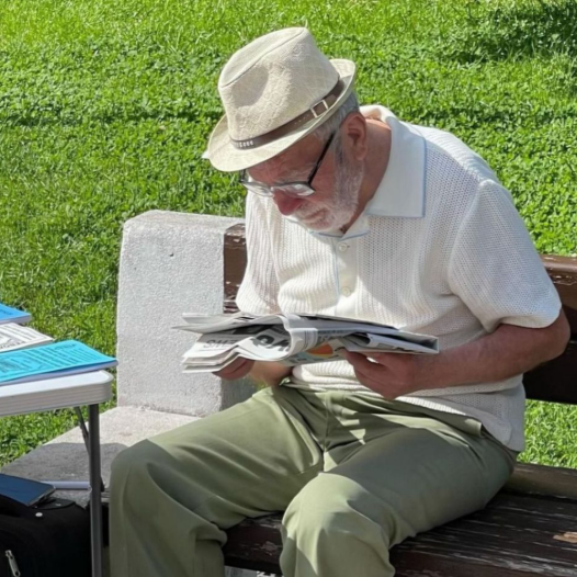 An elderly man picture from the Duolingo English Test image description task.